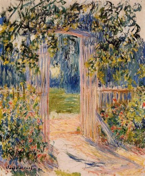 クロード・モネ Painting - 庭園の門 クロード・モネ